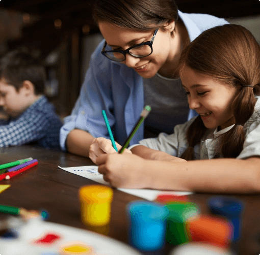 Teacher helping a child